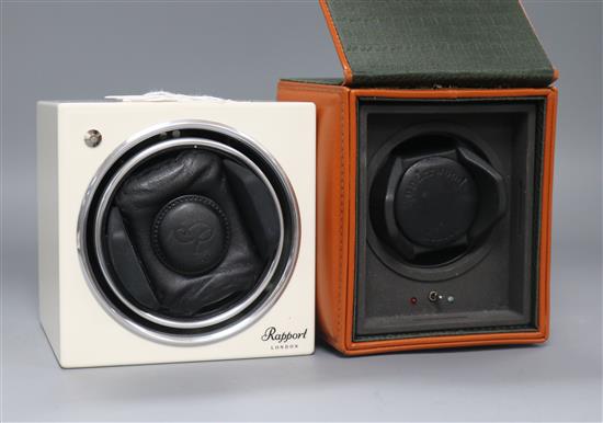 A Rapport Automatic mains-operated watch winder and an Underwood mains/battery-operated winder in leather case